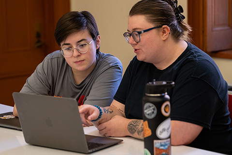 Students working together on a computer