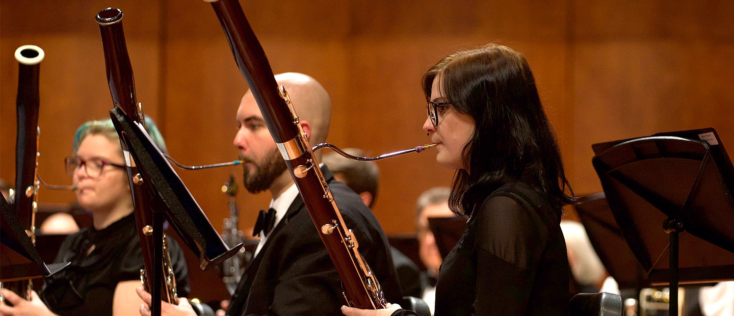 Students playing bassoons during a music concert