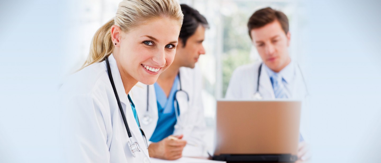 Doctors sitting around a table 