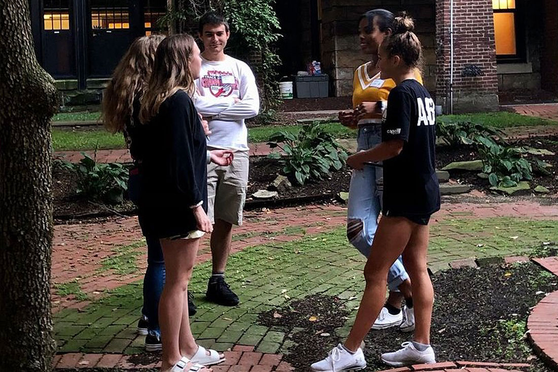 Students enjoying the courtyard at the Opening Dessert Reception.