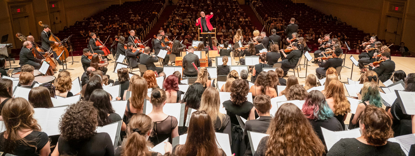 Students and faculty on stage at Carnegie Hall